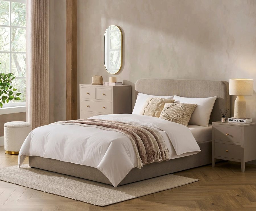 Bright bedroom with an upholstered bed