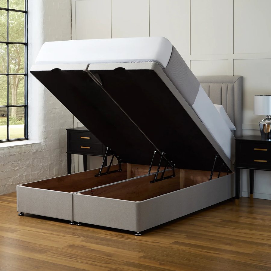 Grey ottoman bed with the storage base lifted open